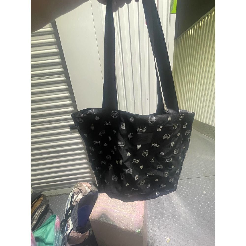 Vintage multi logo black weekender tote bag vs pink